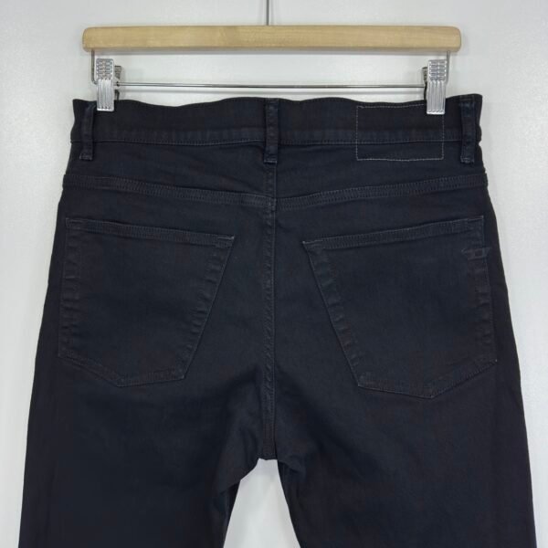 Back waistband and rear pockets of Diesel 2005 black jeans