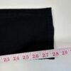 IMG_5689 Large Tape measure beside a leg opening of Diesel 2005 black jeans